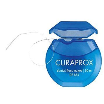 Curaprox, зубна нитка вощена з ароматом м'яти (50 м.) 6010-2560 фото
