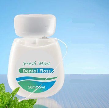 Зубная нить Dental Floss мята 50 м 9210-6731 фото